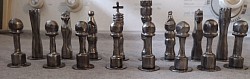 Pieces to all metal heat treated welded chess board